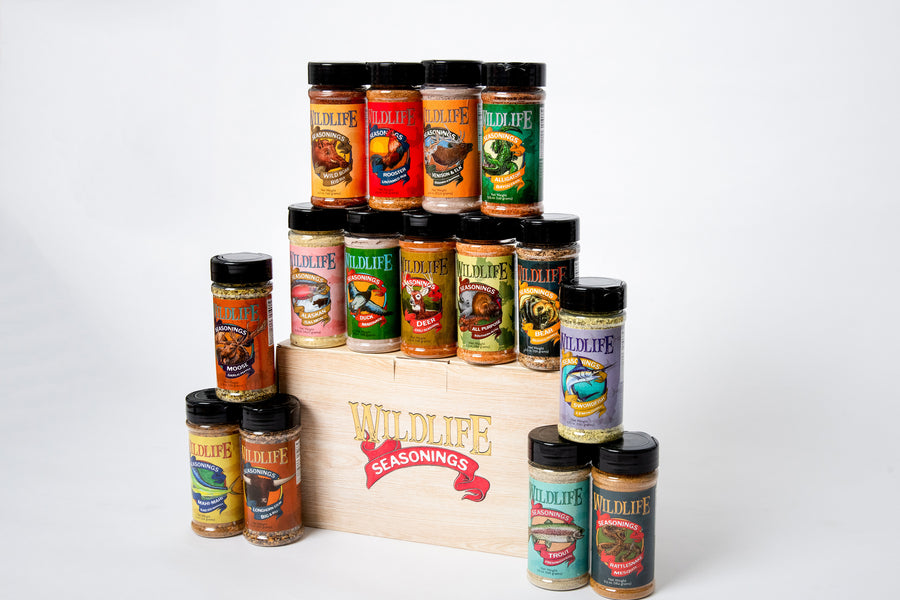The Trophy Case Gift Pack by Wildlife Seasonings. Includes 15 seasonings, rub & marinades. Wild Boar Rib Rub, Rooster Untamed Rub, Venison & Elk Seasoning & Marinade, Alligator Bayou Cajun, Alaskan Salmon Seasoning, Duck Marinade, Deer Chili Seasoning, All Purpose Southern Blend, Bear Rubbed Pepper Blend, Moose Garlic Pepper, Mahi-Mahi Island Jerk Marinade, Longhorn Steak Big & Bold Seasoning, Swordfish Lemon Pepper, Trout Freshwater Blend and Rattlesnake Mesquite Seasoning.